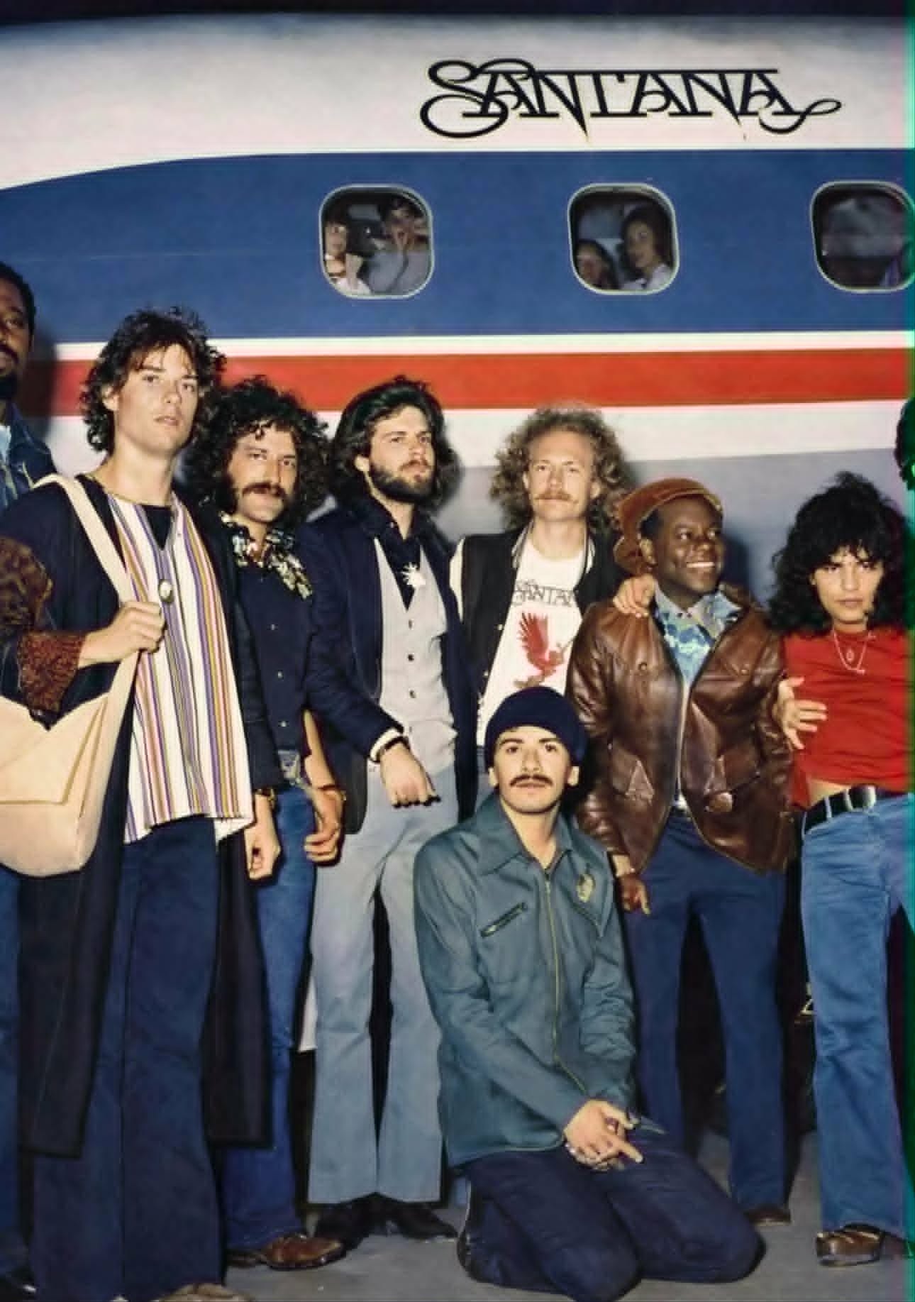 Santana #14. Doug Rauch (b) not pictured. 3rd & 5th from left (standing) are crew members